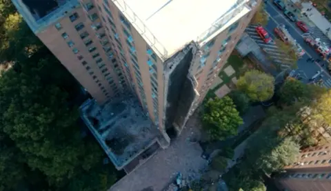 New York City Apartment Building Suffers Partial Collapse After Apparent Explosion