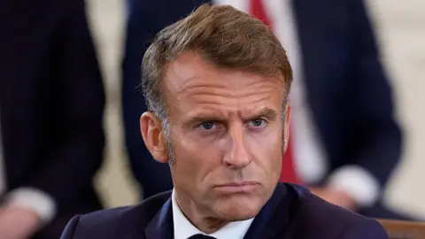 France's Political Turmoil: Macron Faces Pressure to Appoint New Prime Minister Amid Protests