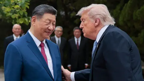 Trump's Visit to China: A Shift in Rhetoric Amidst Long-standing Tensions