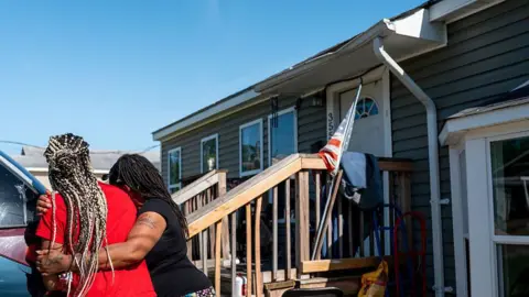 Tragic Escape: Woman and Child Jump from Rooftop in Louisiana Shooting