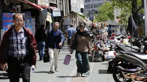 Tehran's Everyday Struggles Amid War and Economic Woes