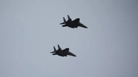 Mid-Air Collision of South Korean Fighter Jets Attributed to Pilot Photography