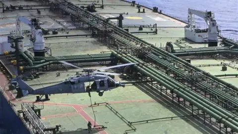 US Navy Takes Action Against Iranian Oil Shipment Amid Escalating Tensions